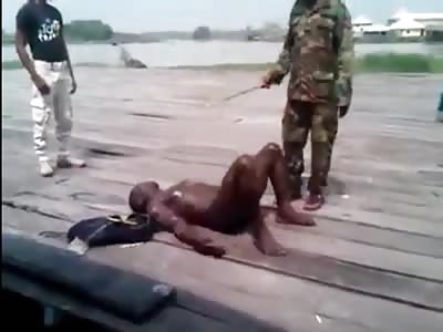 Two Men Are Tortured With Foot Lashings