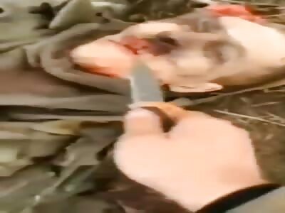 Dead Russian Gets Stabbed In The Head