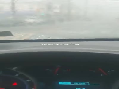 Woman does everything to protect her 'weave' during rain...