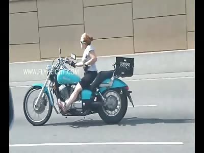 Woman Caught Riding A Harley While Allegedly Being High On Drugs