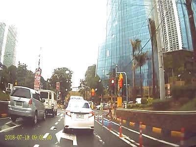 Look before you open taxy door