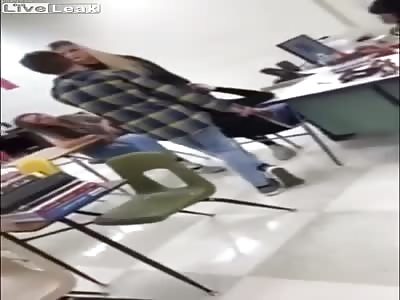 Girl fight in a classroom