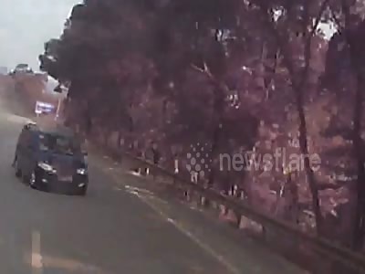 Coach crashes bus on bridge