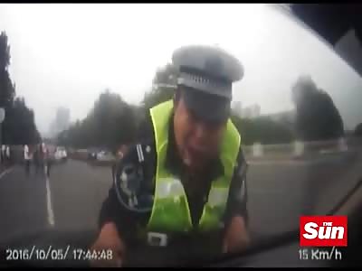 police and charged in the car's hood