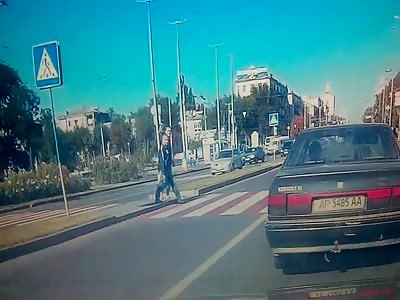 Dude Brutally struck by Car in the Crosswalk Flies Away