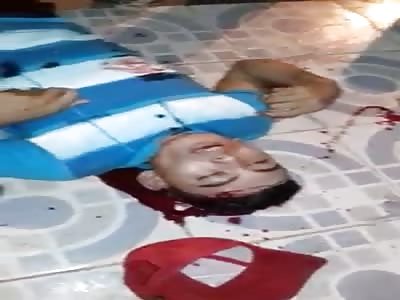 Two Young Man Shot in the Head Many Times Still Agonizing on the Sidiewalk