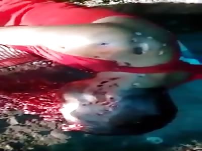 Disfigured man with shotgun on face