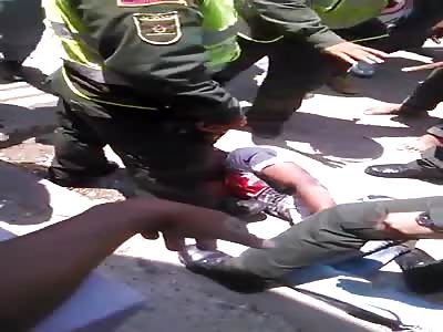 Thief is beaten by popular and is almost killed save by police