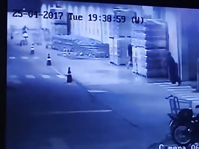 Man shoots at a woman and drives over her