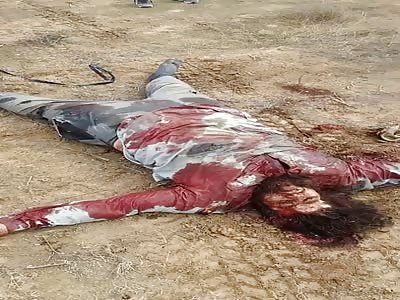 daesh dragges in batlefield 