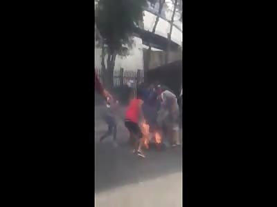 Man Sets Himself on Fire and People Tries to Help