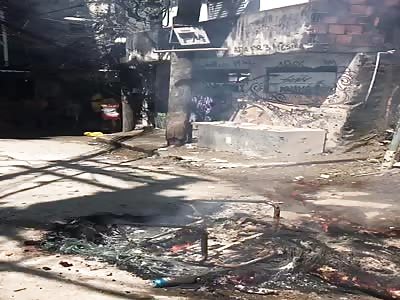 man burned  in favela