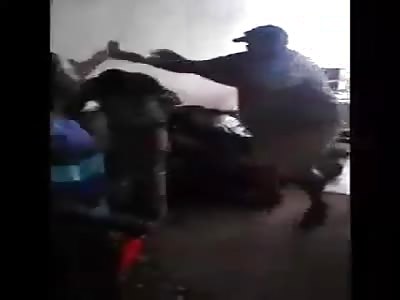 Two black men beaten by fat guy.