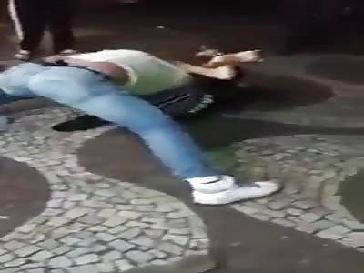 man takes a striking blow in a fight