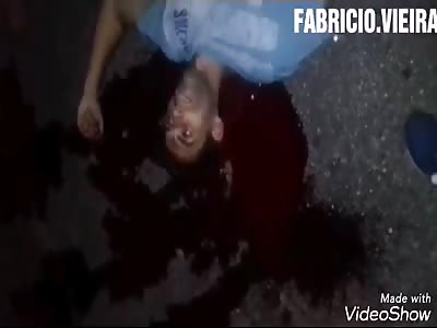 man takes a shot at the head and gets up and walks away