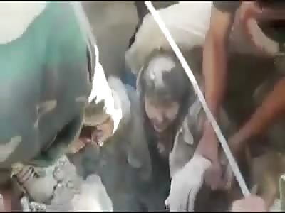 this poor soldier is fucked with his body buried in the rubble