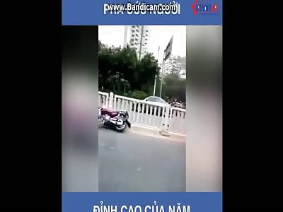 man burning on street