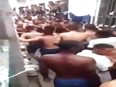 fists of prisoners in the chain of Brazil they need machetes knives and axes