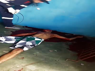 man agonizing after shots