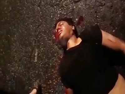 man agonizing after shot