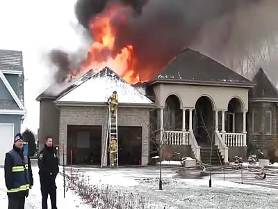 Firefighters fall off ladder at house fire