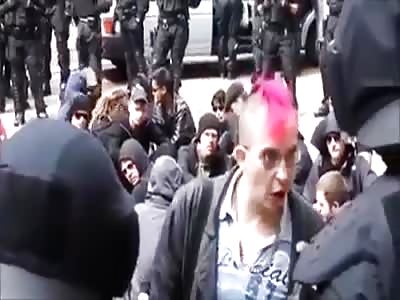 Antifa idiot gets on with the police