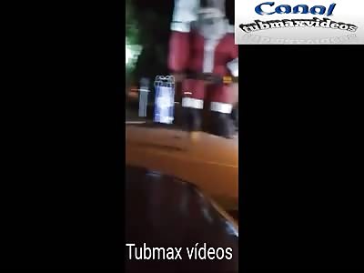 thugs set fire to Santa claus 