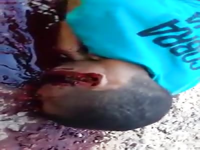 shot dead lying in a pool of blood