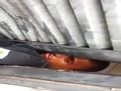 gangster gets stuck in a door