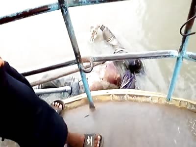 dead guy's head turns black and looks like its ready to explode 