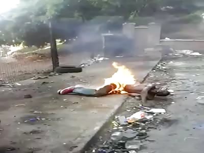 man is being burned alive no one helps him
