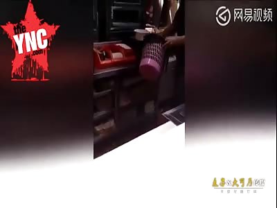 kfc staff, remove French fries from the trash and then put them back into the box