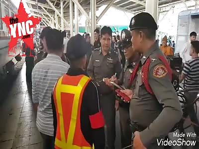 a dead white Unidentified female suicide on a train in  Thailand.