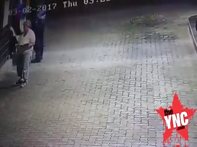 a white  African mother and son attract by black thugs