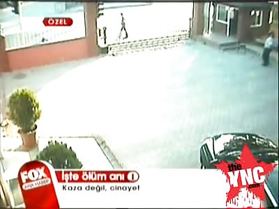 Car sliding sideways takes out a guy