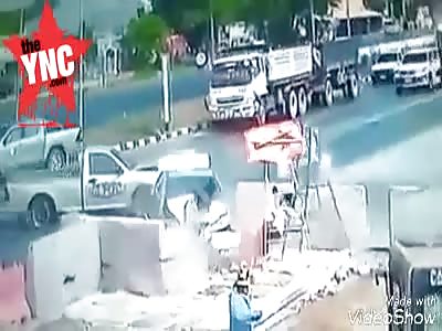 a man is ejected out of his windscreen at a construction site