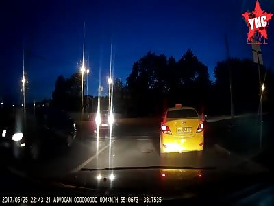 taxi  crashed into a motorcycle causing a giant fireball and the rider and passenger to eject from the vehicles