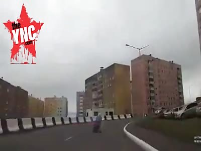 man and other man gets crushed by a Toyota suv the  motorcycle did not have a driving license