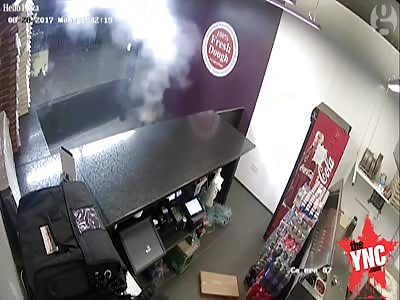 in England a Man throws 70 lit fireworks into Liverpool pizza takeaway