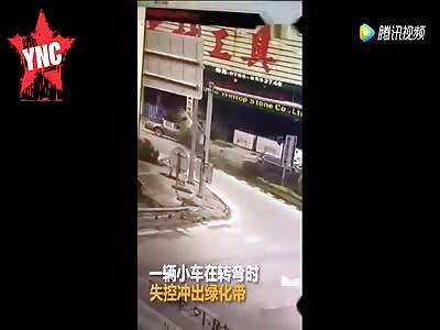 car out of control  break through the green belt then fly into the store