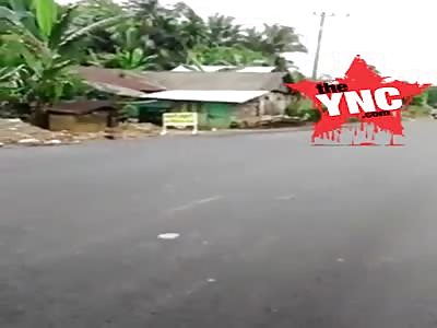 citizen holding a machete is shot dead in Indonesia 