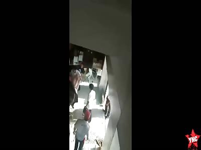 a black Toyota Avanza crashed into a kfc in Indonesia 