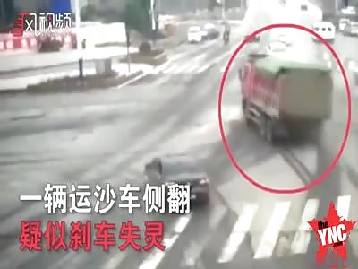 three people were killed and one was injured when sand truck falls on to them in Guizhou  