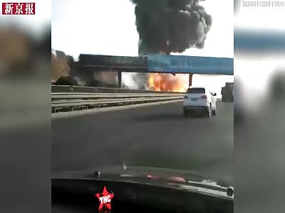 man nearly burned alive in his car  in  Beijing