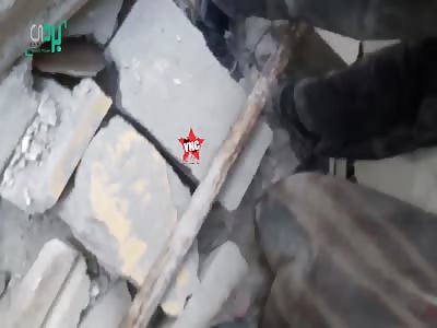 youth finds his dead father in the rubble after a explosion in east ghouta 