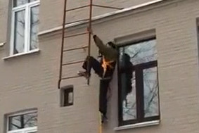 Russians  fall from the fire escape ladders @0:50