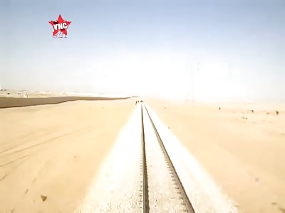 Train tramples camel