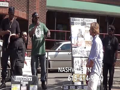 white man forced to kiss the boots of the biggest anti white  black racist group @3:37 