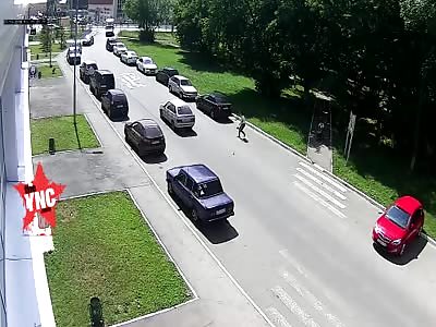 boy dragged under a car in Russia 