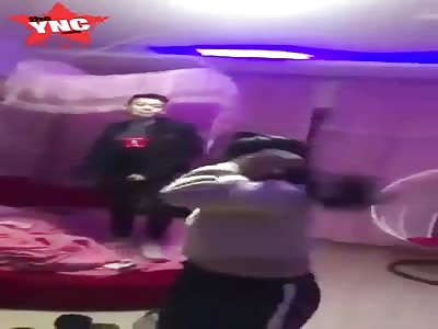 a Chinese gangster beats up his property